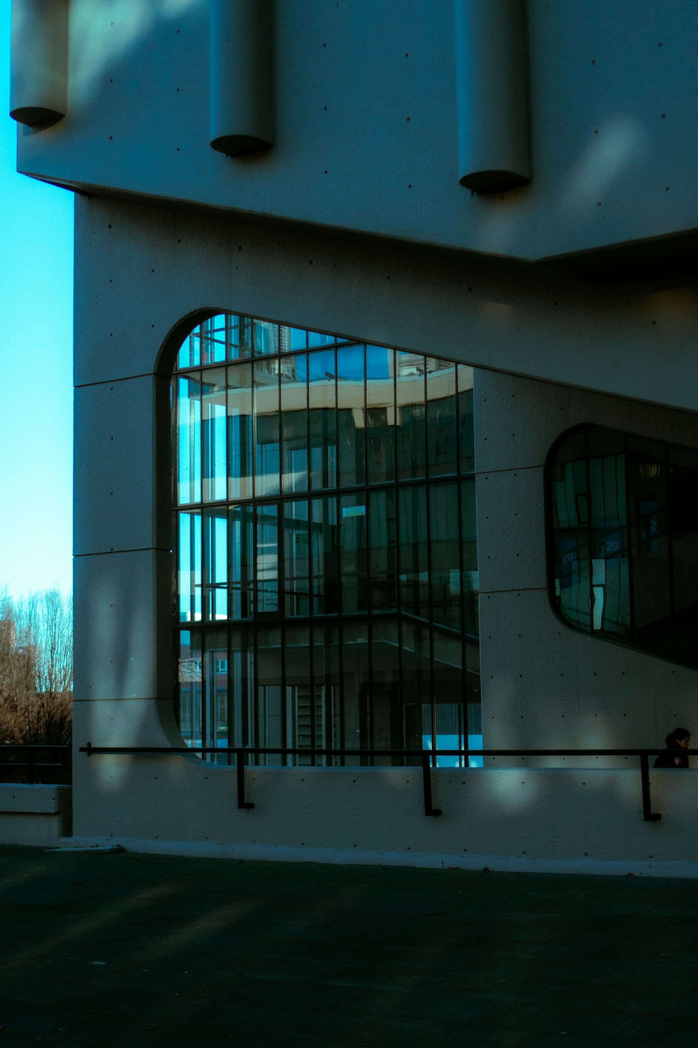 Concrete structure and reflective glazing of a contemporary building